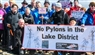 Standing tall: protesters climb Lake District hill as anti-pylon movement grows 